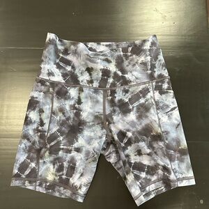 ATHLETA SALUTATION STASH POCKET 7” size small